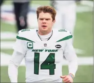  ?? Stew Milne / Associated Press ?? The Jets traded QB Sam Darnold to the Panthers on Monday for three draft picks.