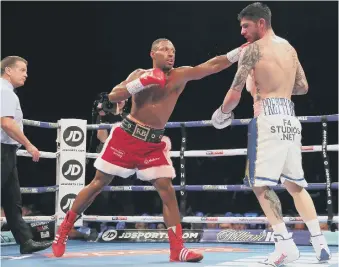  ??  ?? Kell Brook (left) on his way to victory over Michael Zerafa in Sheffield on Saturday.