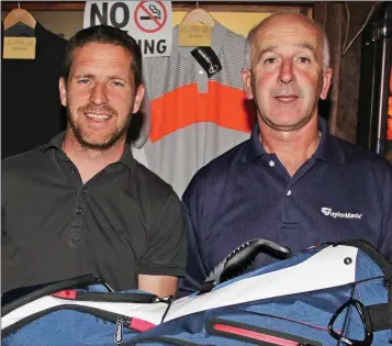  ??  ?? John Purcell (left), President of the Gate Golf Society in New Ross, presenting his prize to John Kehoe in the Three Bullet Gate on Saturday.