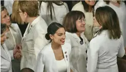  ??  ?? New York Representa­tive Alexandria Octavio-Cortez (centre) is seen amidst other Congress women at the State of the Union address.