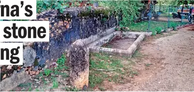  ??  ?? A neglected site containing a cattle back scrub stone and water trough in Keerimalai, Jaffna