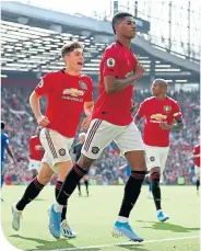  ??  ?? Marcus Rashford celebrates his goal