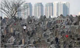  ?? Photograph: Jérôme Favre/EPA ?? Diamond Hill cemetery, on the outskirts of Hong Kong.