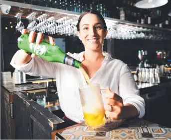  ?? Picture: ALIX SWEENEY ?? BIG MOVE: Shorehouse assistant manager Andrea Kirkham after the council announced a new COVID-19 plan that will allow businesses to serve alcohol outside.