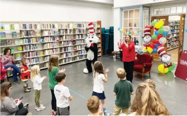  ?? ?? On Thursday, March 2, children and parents gathered at the Starkville Public Library for Dr. Seuss Storytime to kickoff Read Across America Week. (Photo by Cal Brown, SDN)