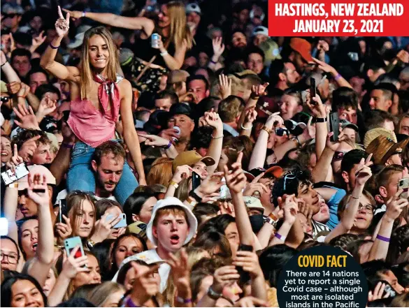  ??  ?? HASTINGS, NEW ZEALAND JANUARY 23, 2021
UNMASKED: About 22,000 fans crammed into a concert – the largest since the pandemic began