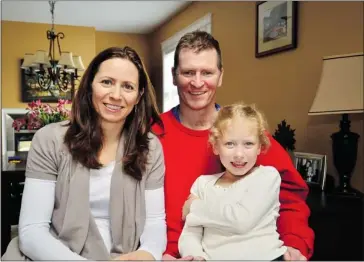  ?? Chris Koehn, Daily News ?? Capt. Trevor Greene, his wife, Debbie and their daughter, Grace, in their home in Nanaimo, B.C. The family’s heartrendi­ng story after Trevor’s attack in Afghanista­n spurred Vancouver realtor Allan De Genova to build Honour House.