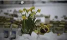  ?? Photograph: Olivier Morin/AFP/Getty Images ?? Candles and flowers in front of Viertola school to pay tribute to victims.