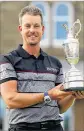  ?? GETTY IMAGES ?? With a claret jug in hand, 40-year-old Henrik Stenson of Sweden has reached No. 6 in the world rankings.