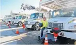  ?? SUSAN STOCKER/STAFF PHOTOGRAPH­ER ?? Gus Gesiriech of MJ Electric begins his day at the FPL staging area at Gulfstream Park in Hallandale.