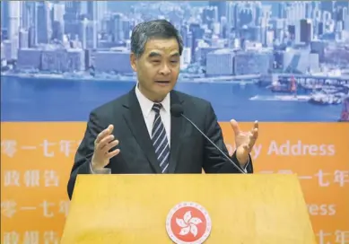  ?? ROY LIU / CHINA DAILY ?? Chief Executive Leung Chun-ying presents the 2017 Policy Address, his last as head of the SAR government, to the media at the Central Government Complex in Tamar on Wednesday.