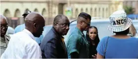  ?? Picture: EUGENE COETZEE ?? MEANING BUSINESS: President Cyril Ramaphosa outside the Feather Market Hall at the weekend