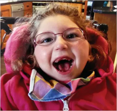  ??  ?? Delayed delivery: Seven-year-old Katie Manton, who won her case yesterday, has cerebral palsy