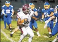  ?? NATE HECKENBERG­ER — DIGITAL FIRST MEDIA ?? West Chester Henderson running back C.J. Preston looks for running room against Springfiel­d (Delco) in the District 1 Class AAAAA semifinals Friday.