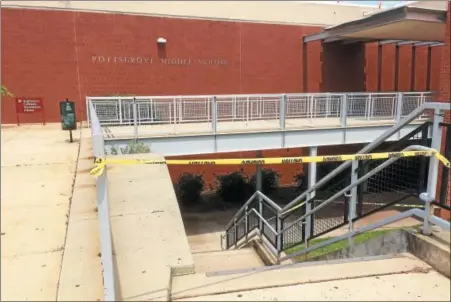  ?? EVAN BRANDT — DIGITAL FIRST MEDIA ?? The Pottsgrove School Board voted Aug. 14 to spend up to $35,000 to refurbish this bridge into the back entrance of Pottsgrove Middle School.