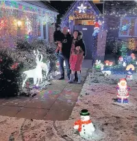  ??  ?? The Williams family Christmas lights