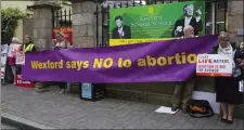  ??  ?? Protesters outside St Michael’s Theatre last Thursday.