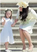  ?? AP ?? SHOWSTOPPE­R Princess Charlotte and Kate, Duchess of Cambridge after the wedding ceremony of Prince Harry and Meghan Markle. —