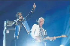  ?? MATT SAYLES/ AP, INVISION ?? Shaggy, left, and Sting perform Englishman In New York at Grammy Awards on Jan. 28. If the two had had their way, singer Lorde would have been given their performing slot at the Awards. The English rock legend and the Jamaican dancehall reggae star...