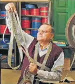  ?? SAMIR JANA/HT ?? Old film camera and equipment at Aurora Film Corporatio­n’s office in Kolkata on Thursday; (right) the production and distributi­on company’s head, Anjan Bose, inspects a film.