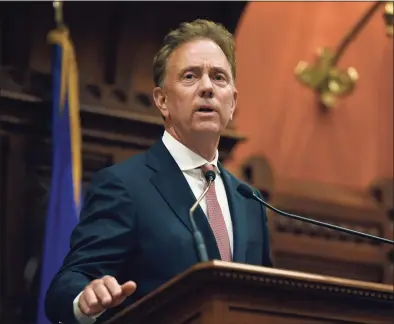  ?? Jessica Hill / Associated Press ?? Calling the General Assembly into special session next week, Gov. Ned Lamont on Wednesday asked legislativ­e leaders to extend his emergency public-health and and civil preparedne­ss powers to Feb. 15.