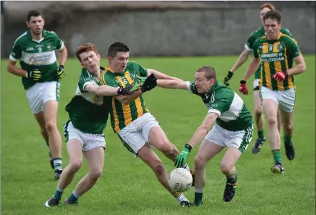  ?? Lispole’s Garreth Noonan is tackled by Cian Bradley, Listry, in their County JFC semi-final in Strand Road. Photo by Domnick Walsh ??