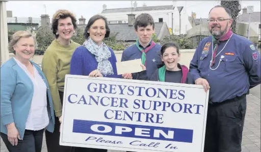  ??  ?? 1st Wicklow 2nd Dublin Scouts St Kilians present a cheque from their Bricfeasta Mór to Greystones Cancer Support (L-R) Susan Chestnutt, Cllr Kathleen Kelleher, Íde Clark, Cian Gaines, Aoife Finnegan and scout master Anthony Finnegan