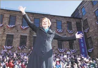  ?? Scott Eisen / Getty Images ?? Sen. Elizabeth Warren, D-Mass., announces her bid for president on Saturday in Lawrence, Mass.