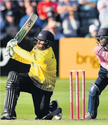  ??  ?? Kieran Noemabarne­tt hits out against Middlesex