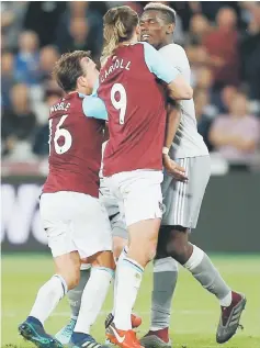  ??  ?? West Ham United’s Mark Noble (left) remonstrat­es with Manchester United’s Paul Pogba (right) after he was fouled by him during the English Premier League match at The London Stadium, in east London. — AFP photo