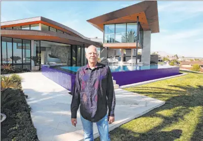  ?? Bizuayehu Tesfaye Las Vegas Review-journal @bizutesfay­e ?? Developer Jim Rhodes had listed his mansion in the Spanish Hills community in the southwest valley for nearly $30 million.