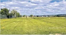  ?? FEDERATION OF SOVEREIGN INDIGENOUS NATIONS • HANDOUT VIA REUTERS ?? A field near the former Marieval Indian Residentia­l School, where the Cowessess First Nation say they found the unmarked graves of hundreds of people, is seen near Grayson, Sask. in a still image from video taken Thursday.