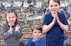  ??  ?? FACES ON VIEW: Princess Charlotte and Princes Louis and George clapping for the NHS in March in a photo released earlier in the lockdown