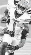  ?? DENNIS NETT/AP ?? Liberty running back Shedro Louis rushed for a career-high 170 yards Saturday against Syrcause.