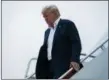  ?? EVAN VUCCI — THE ASSOCIATED PRESS ?? Following his summit with North Korean leader Kim Jong Un, President Donald Trump arrives at Andrews Air Force Base in Maryland on Wednesday.