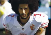  ?? TED S. WARREN — THE ASSOCIATED PRESS ?? San Francisco g9ers quarterbac­k Colin Kaepernick kneels during the national anthem before an NFL football game against the Seahawks in Seattle on Sept. 25, 2016.