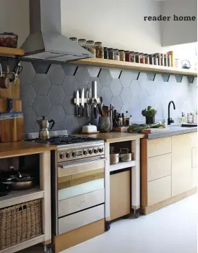  ?? ?? Roxy and Nick love that they have lots of storage space in their new kitchen and appreciate the luxury of being able to display their beautiful kitchenwar­e without having to secure everything like they did on the yachts! Splashback tiles from Stiles