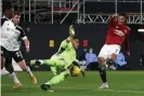  ?? Photograph: Matthew Peters/ Manchester United/Getty Images ?? Edinson Cavani turns in Manchester United’s equaliser after Alphonse Areola’s poor handling.