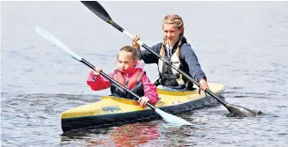  ?? ?? i Paddle power: young and old can learn kayaking at Holkham Hall’s Festival of Sport