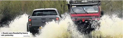  ?? Jacob King ?? Roads were flooded by heavy rain yesterday