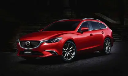  ??  ?? THE NEW Mazda6 wagon in “soul red” has a sharpened look that’s fit for a sports car.
