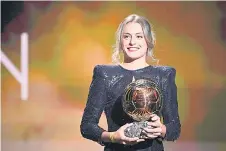  ?? — AFP photo ?? Putellas poses after being awarded the women’s Ballon d’Or award during the Ballon d’Or France Football award ceremony at the Theatre du Chatelet in Paris.