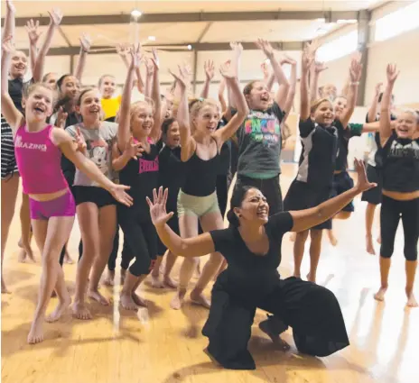  ?? Pictures: MARIJA NESOVIC ?? Clover Hill State School students get into the spirit of Meera during a practice session.