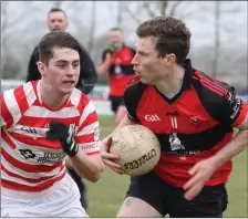  ??  ?? Niall Harney of Bannow-Ballymitty is faced by Niall Murphy.