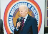  ?? PATRICK SEMANSKY/AP ?? President Joe Biden visits a phone bank Friday in Boston. He was giving support to Georgia Sen. Raphael Warnock ahead of Tuesday’s runoff election.