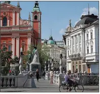  ?? Rick Steves’ Europe/CAMERON HEWITT ?? Ljubljana’s exquisite architectu­re reflects its history as a crossroads of Germanic, Mediterran­ean and Slavic cultures.