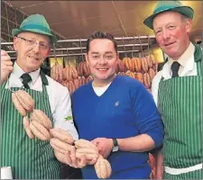  ?? JASON MCGARRIGLE ?? Chef Neven Maguire with butchers and famed sausage makers Ernan and Diarmuid Mcgettigan.