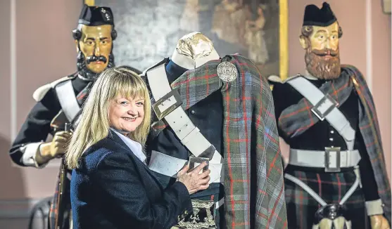  ?? Picture: Craig Stephen. ?? Blair Castle archivist Keren Guthrie adds some finishing touches to the exhibition.