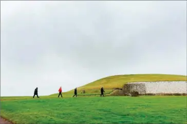  ?? ALEX CRETEY-SYSTERMANS/THE NEW YORK TIMES ?? Newgrange, a Neolithic site that predates Stonehenge, takes on a special significan­ce at the winter solstice, when it aligns with the rising sun.