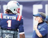 ?? Maddie Meyer / TNS ?? Patriots’ coach Bill Belichick talks with Cam Newton before a game against the Miami Dolphins at Gillette Stadium in 2020.